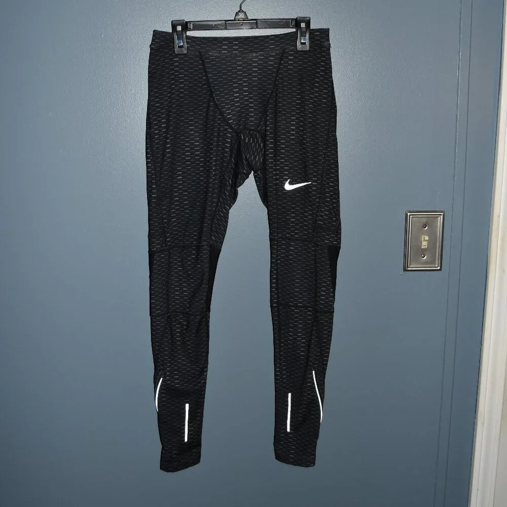 Nike Dri-Fit running tights size Small‎